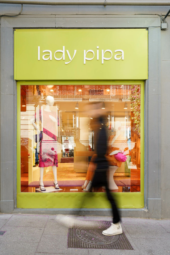 the lime green exterior of Lady Pipa's boutique