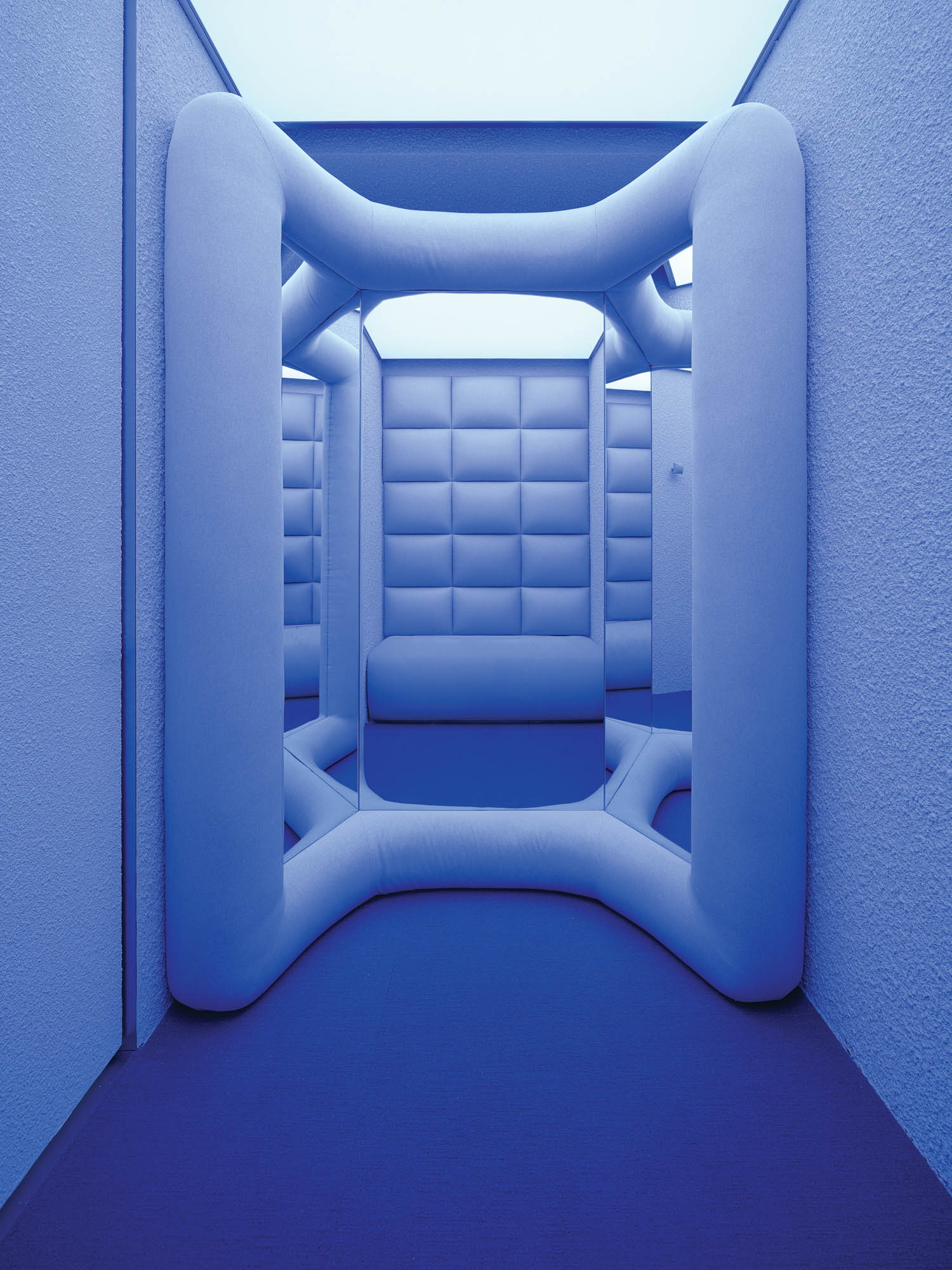 a blue monochromatic fitting room