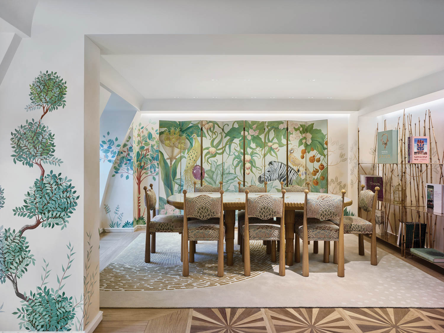 jungle-like murals are painted on the walls in 13 Paix