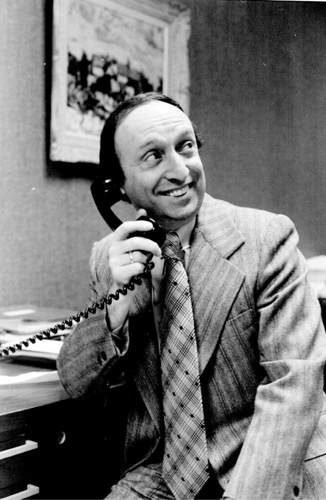 Archival image of Milo Kleinberg on the phone