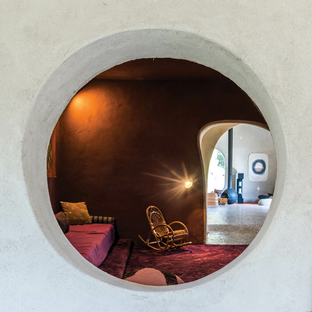 a porthole in the wall of a home